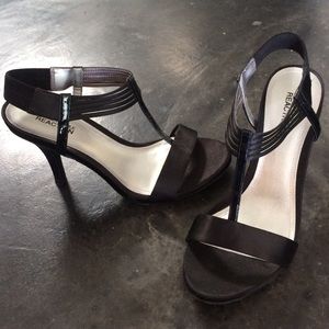 Black satin and patent leather heels