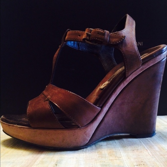 Brown leather t-strap platform sandal.