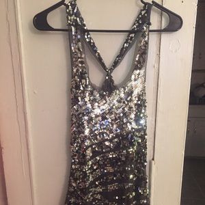 Sequin, mesh tank.