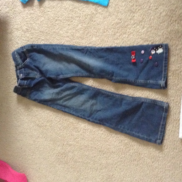 Plain pants with accessorized buttons - Picture 1 of 1