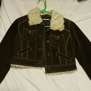 Brown leather jacket with fur on the collar.