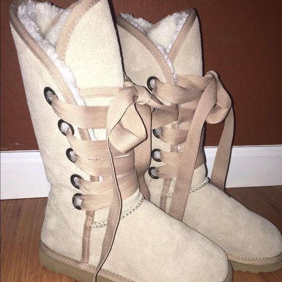 Tan lace-up Uggs