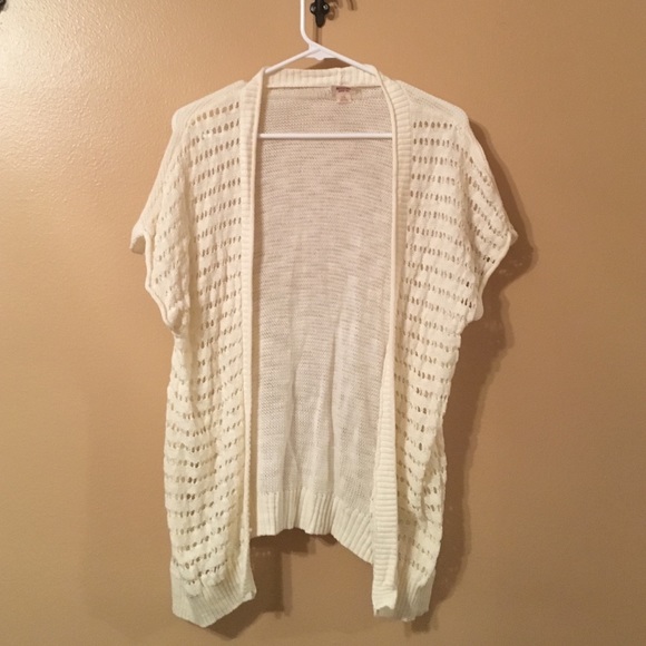 Cream colored short sleeved cardigan