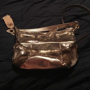 Dazzling gold coach purse!