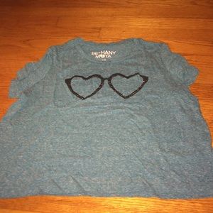 Blue shirts with sunglasses on it