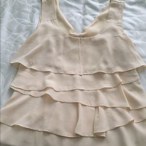 Sleeveless layered blush/beige blouse