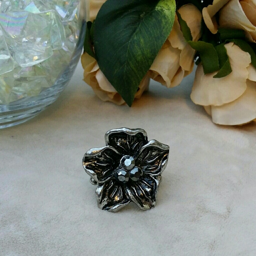Gunmetal floral statement ring with rhinestones
