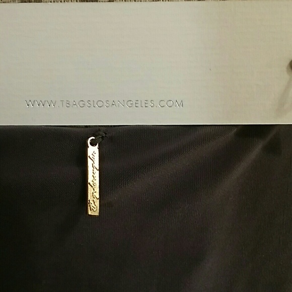 Tbaglosangelous Dress small.😥JUST HAD A STROKE - Picture 2 of 5