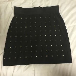 Cute black studded body-con mini skirt