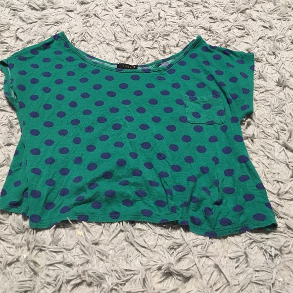 Green and blue polka dot shirt