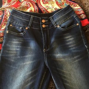 Revolution crop blue jeans.