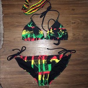 Rasta colored swim suit & matching headband.
