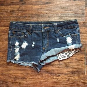 Dark denim distress shorts