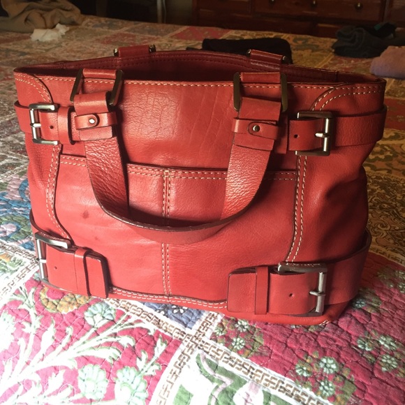 Red Michael Kors handbag