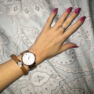 Leather bracelet with gold clasp.