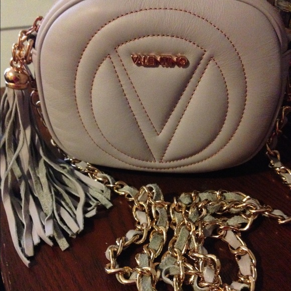 This is a lavender cross body bag is SOLD
