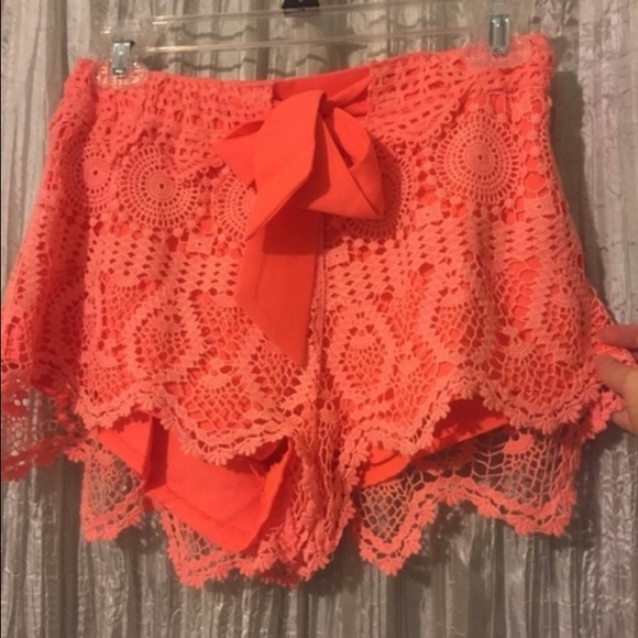 Lacy coral shorts.