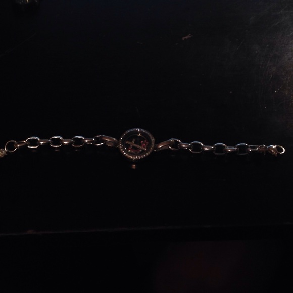 Origami owl bracelet with charms