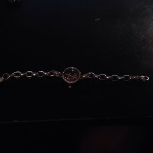 Origami owl bracelet with charms