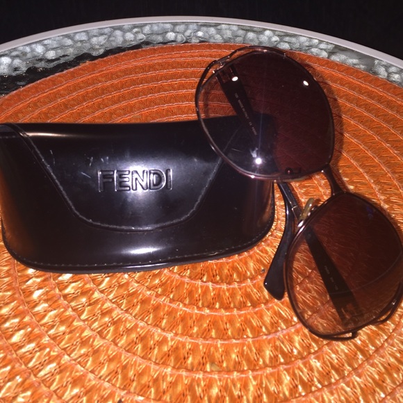 Authentic Fendi Sunglasses with case.