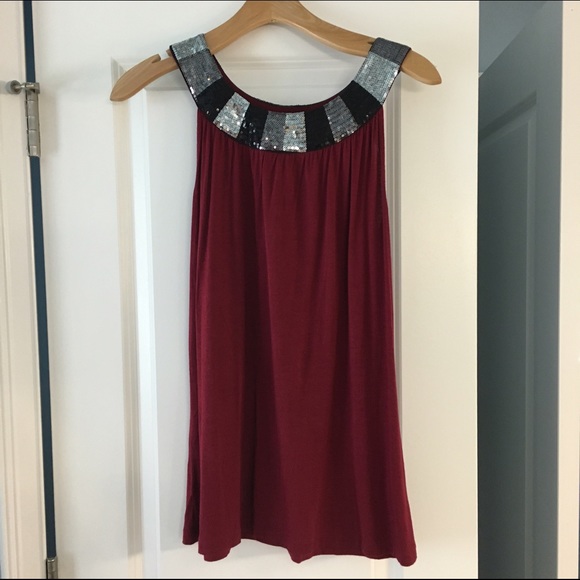 Red tank with sequined neckline.