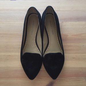 Black slipper flats.