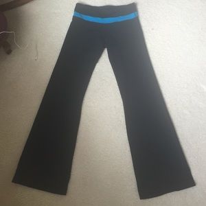 Black lulu lemon pants with bright blue band