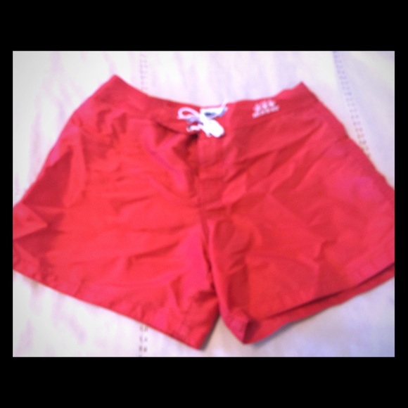 Red board shorts. NWOT