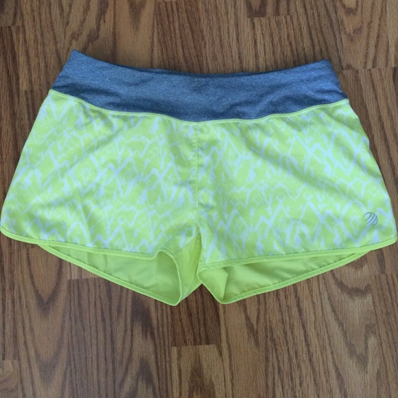 MPG yellow running shorts