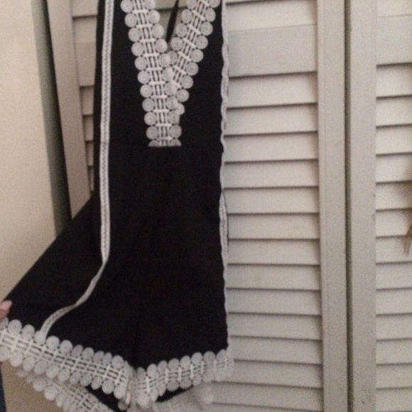 Black with white floral trim romper