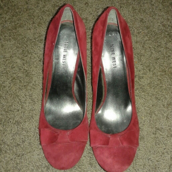 Red suede heels with bows