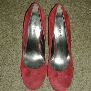 Red suede heels with bows