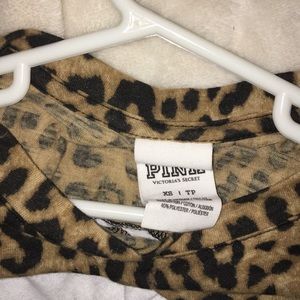 Brand new white tee with cheetah and black stripe