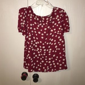 red and white polka dot blouse
