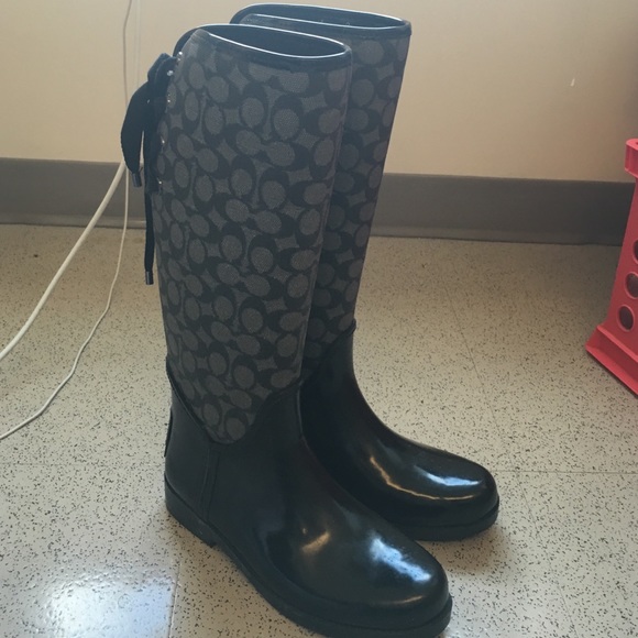 Black and gray Coach rain boots