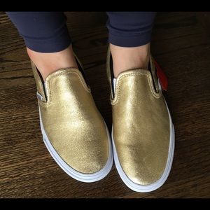 Metallic-gold, slip-on style Vans