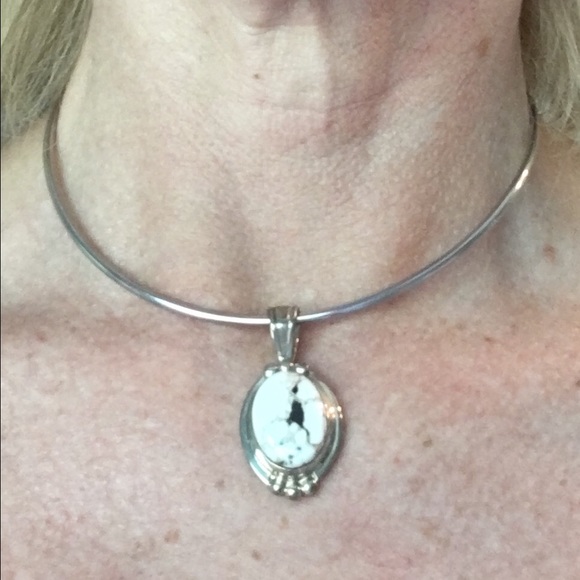 Silver 13 inch choker with white stone pendant.
