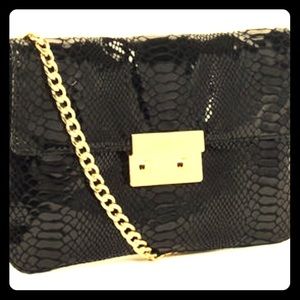 MICHAEL Michael Kors
Python Clutch, shoulder Black