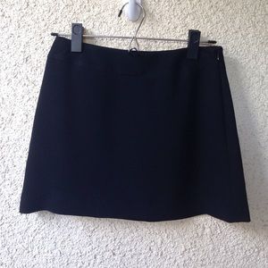 BCBG Maxazria brand black mini skirt.