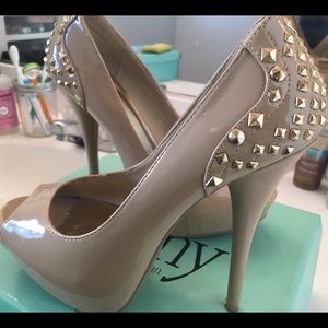 High heels with gold embellishments