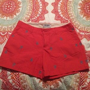 Coral shorts with blue anchors