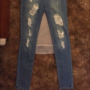 Distressed denim skinny jeans