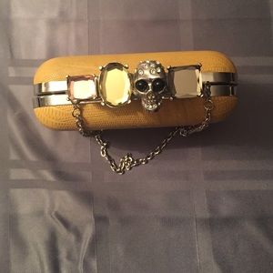 Glam skull brass knuckle purse