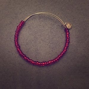 Alex and Ani gold bracelet with small red beads