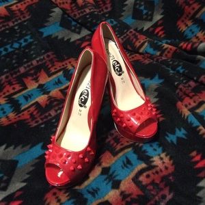Red Spiked Heels