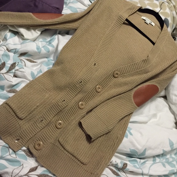 Boyfriend sweater with leather elbow patch.