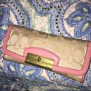Tan/pink Coach wallet