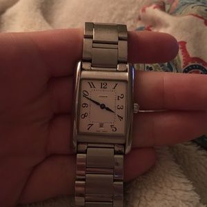 Silver coach watch