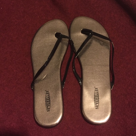 Black strap flip flops