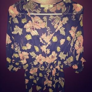 Blue and multi-colored flower blouse.